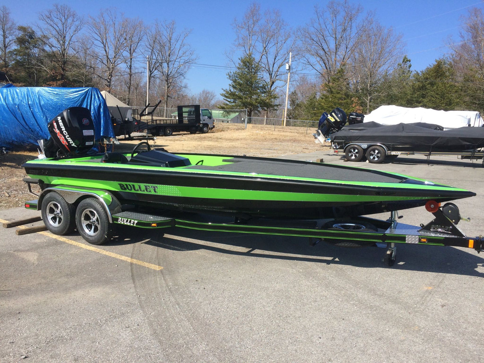 Black and green 2006 Ranger boat painted with Neon Green polyester ISO gel coat.