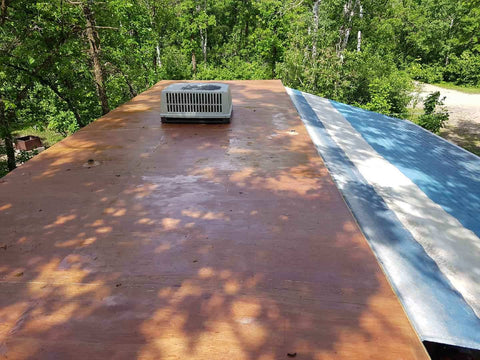 RV roof redone with plywood, 6 ounce fiberglass cloth and epoxy resin.