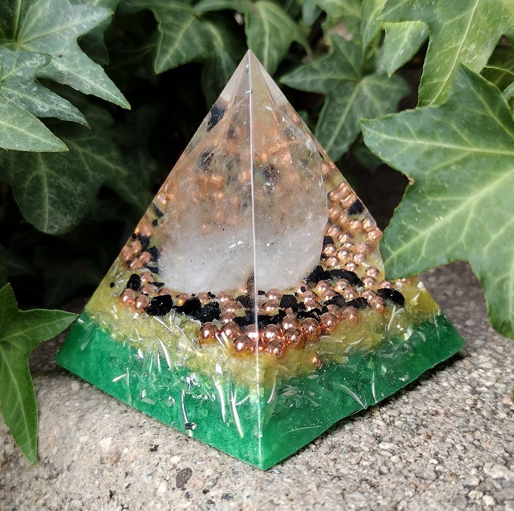 Green, yellow and clear pyramid made with polyester clear casting resin.