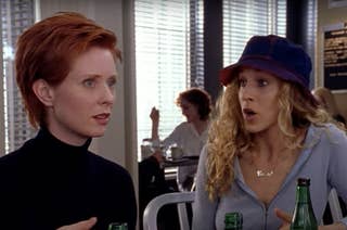 Cynthia Nixon and Sarah Jessica Parker's characters are having a conversation at a diner in a scene from