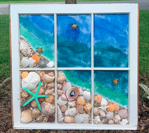 Beach scene art on six pane window made with ProGlas 1000 Epoxy Resin. Includes sea shells, turtle art and sand.